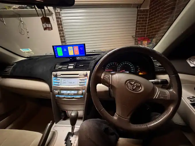 Toyota Camry dashboard with a new wireless Apple CarPlay display fitted